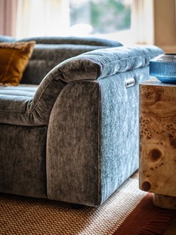 Olson 2.5 Seater in Luxury Textured Chenille Lagoon with Double Power Recliner and Double Power Headrest, £1499. Olson Designer Footstool in Luxury Textured Chenille Brick, £449.