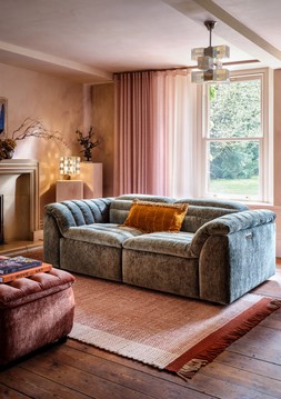 Olson 2.5 Seater in Luxury Textured Chenille Lagoon with Double Power Recliner and Double Power Headrest, £1499. Olson Designer Footstool in Luxury Textured Chenille Brick, £449.
