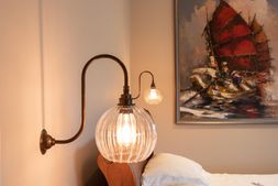 Ribbed Hereford globe swan neck wall lights